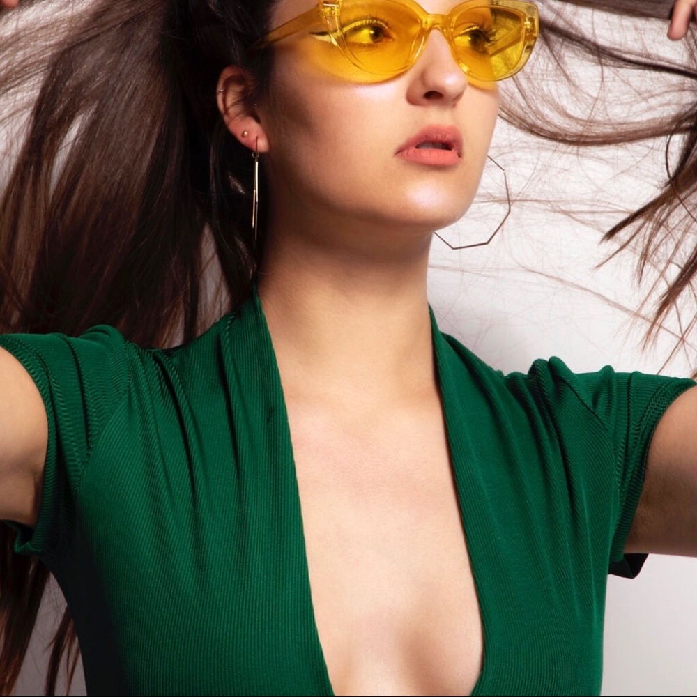 Deep V-Neck Ribbed Bodysuit